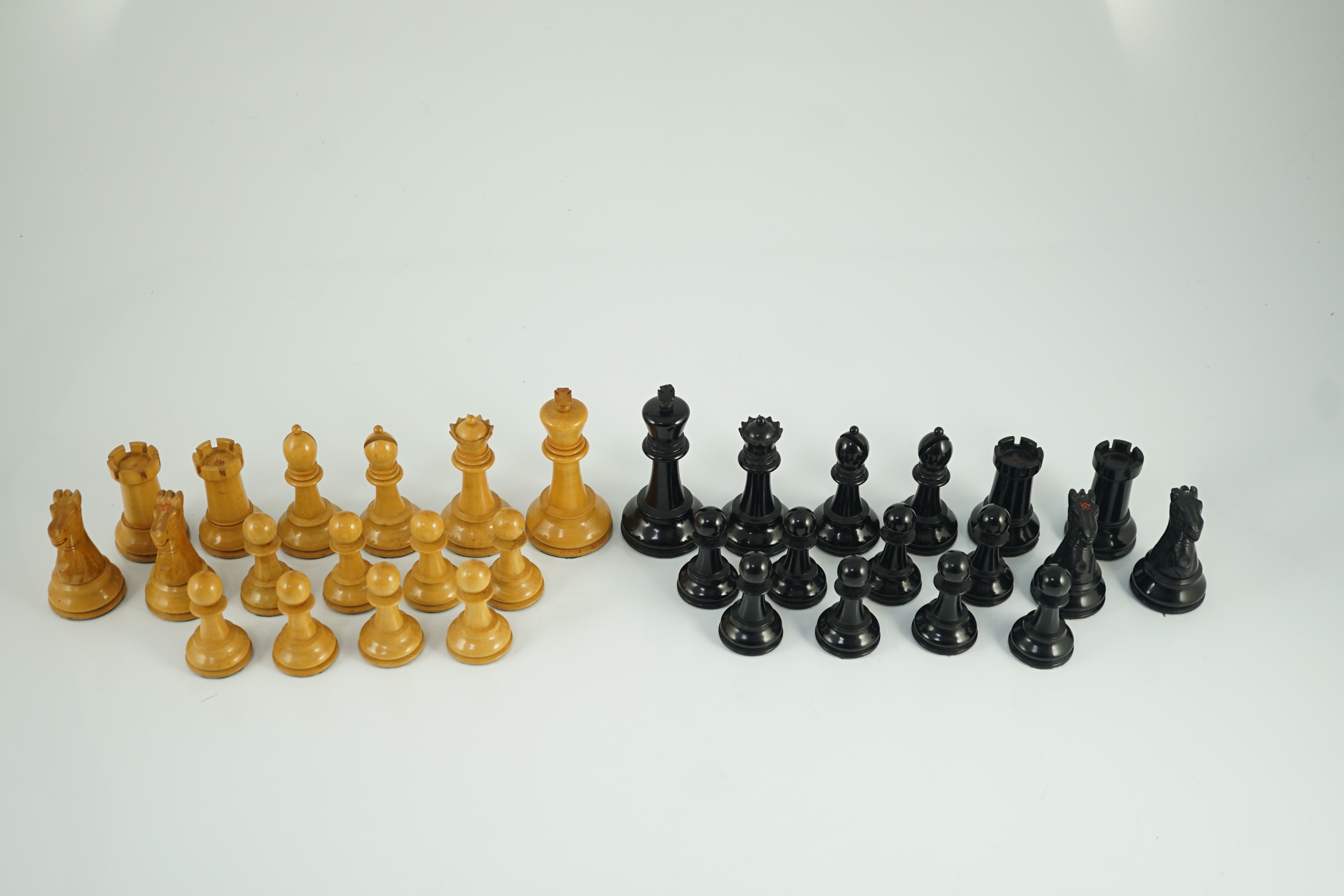 A Jaques & Son Staunton pattern ebony and boxwood chess set, Kings 9.5cm